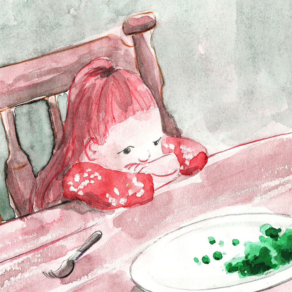 An upset girl sits at the kitchen table staring at her pushed away dinner plate which has unwanted brocolli on it