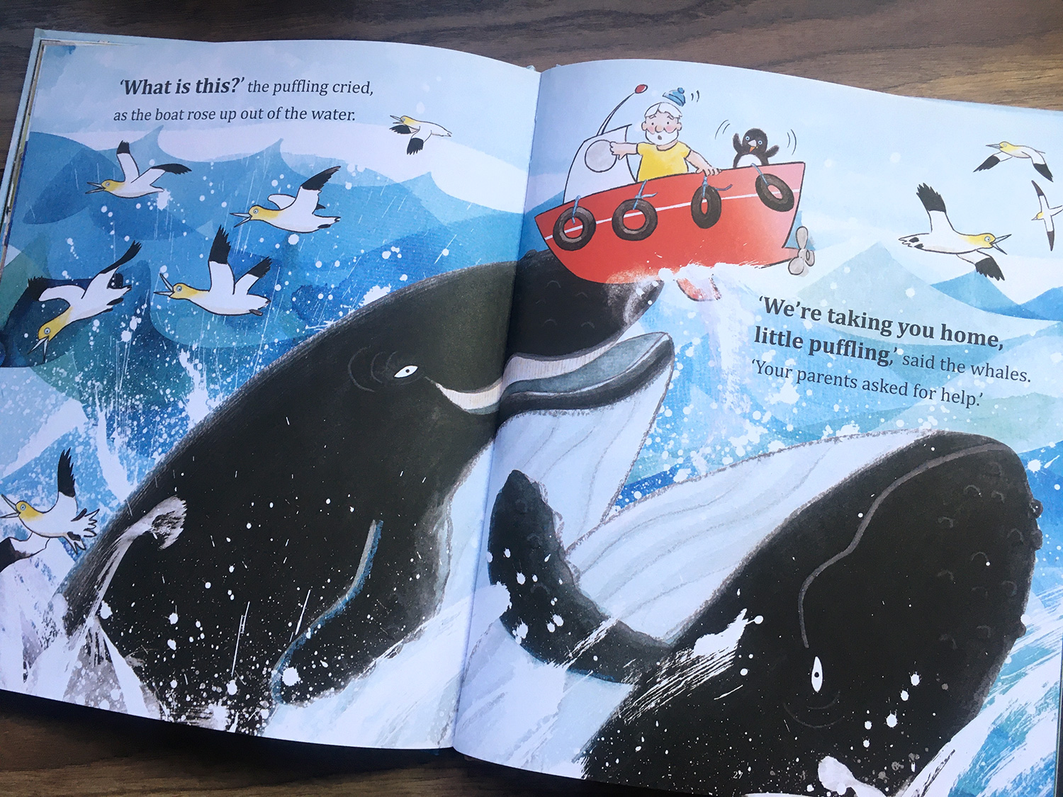 Where Are You Puffling? scene where the whales rise high up with the boat carrying puffling